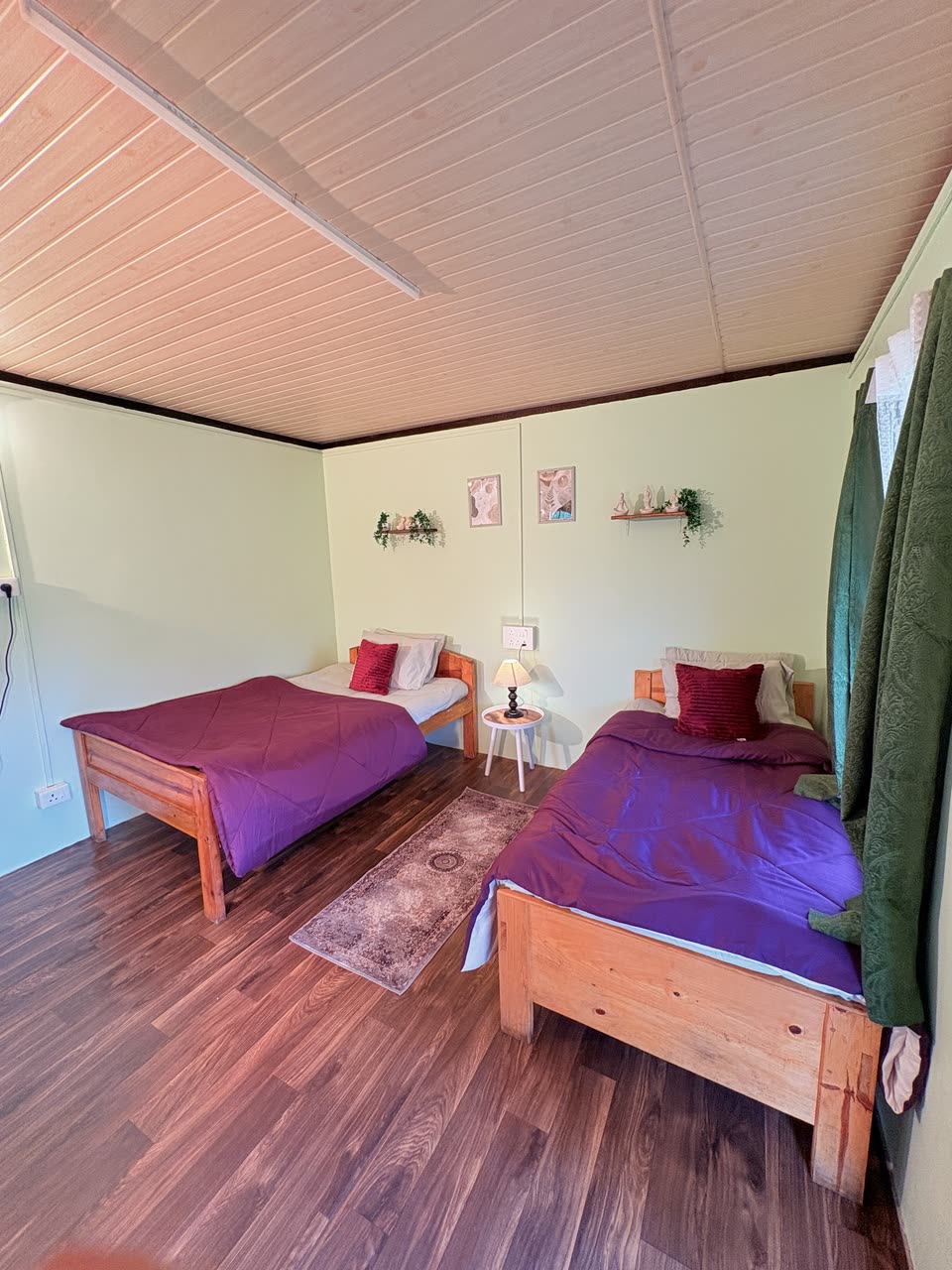 Bedroom dressed in plum and white